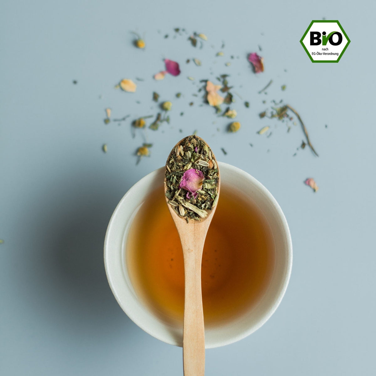 Relaxing tea with chamomile and rose petals