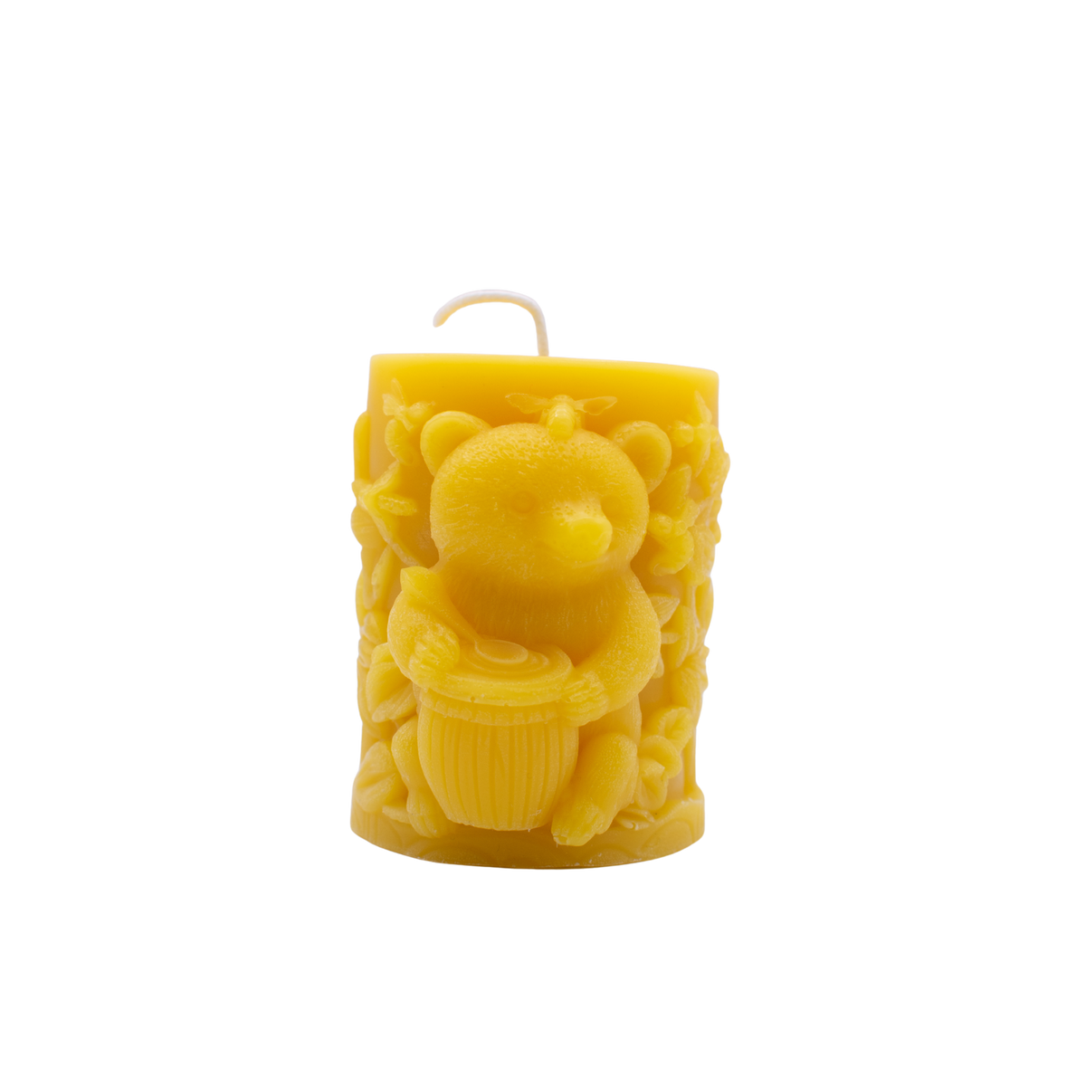 Bear and honey pot beeswax candle shown from a second angle