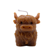 Beeswax candle moulded as a Highland cow with shaggy coat