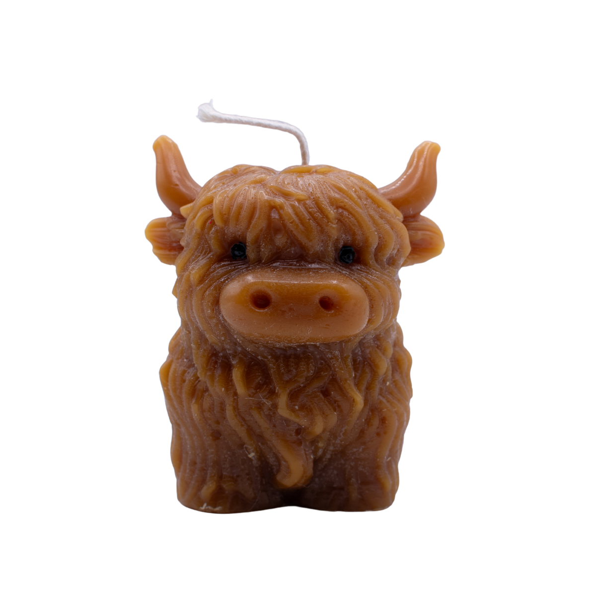 Beeswax candle moulded as a Highland cow with shaggy coat
