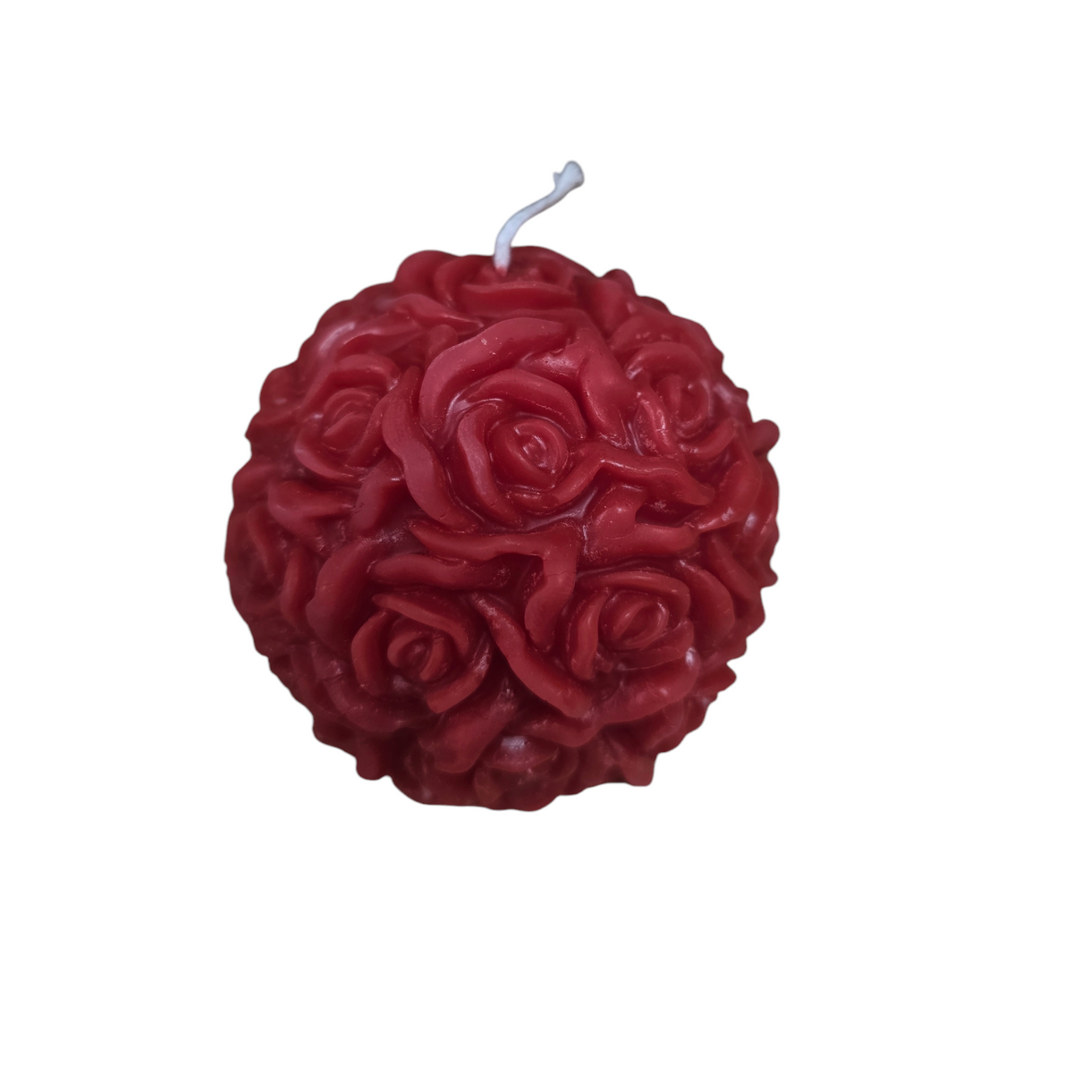 Beeswax candle moulded as a ball of roses