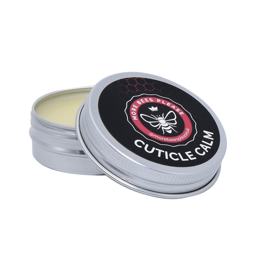 Cuticle Calm beeswax balm in a small round tin