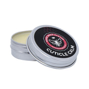 Cuticle Calm beeswax balm in a small round tin